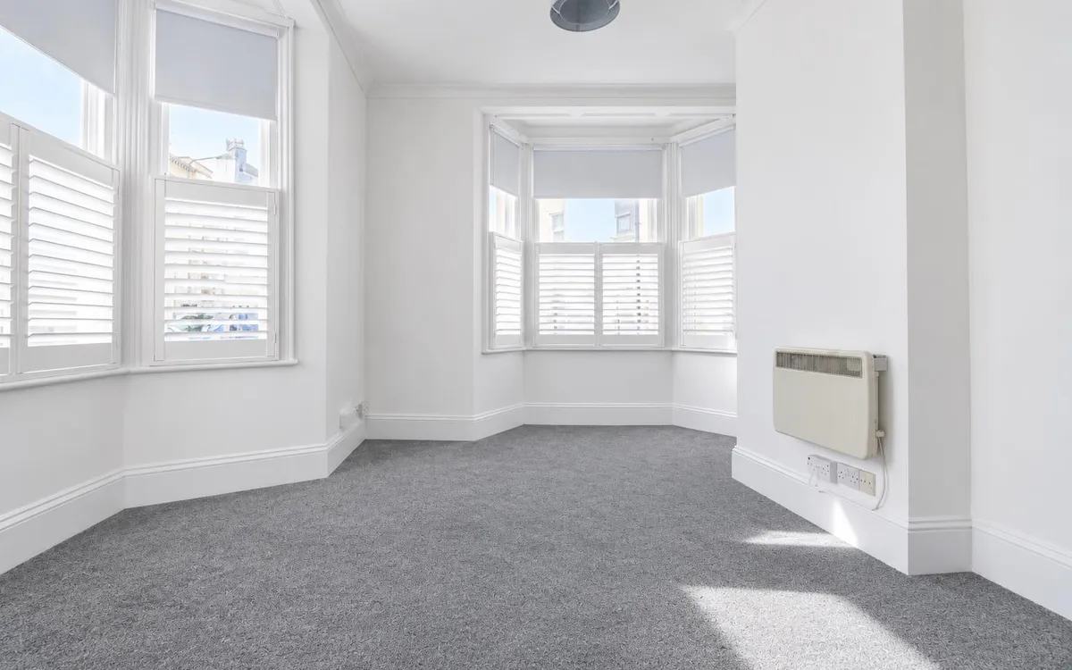 West park avenue st helier 35007870 bright empty room with bay windows