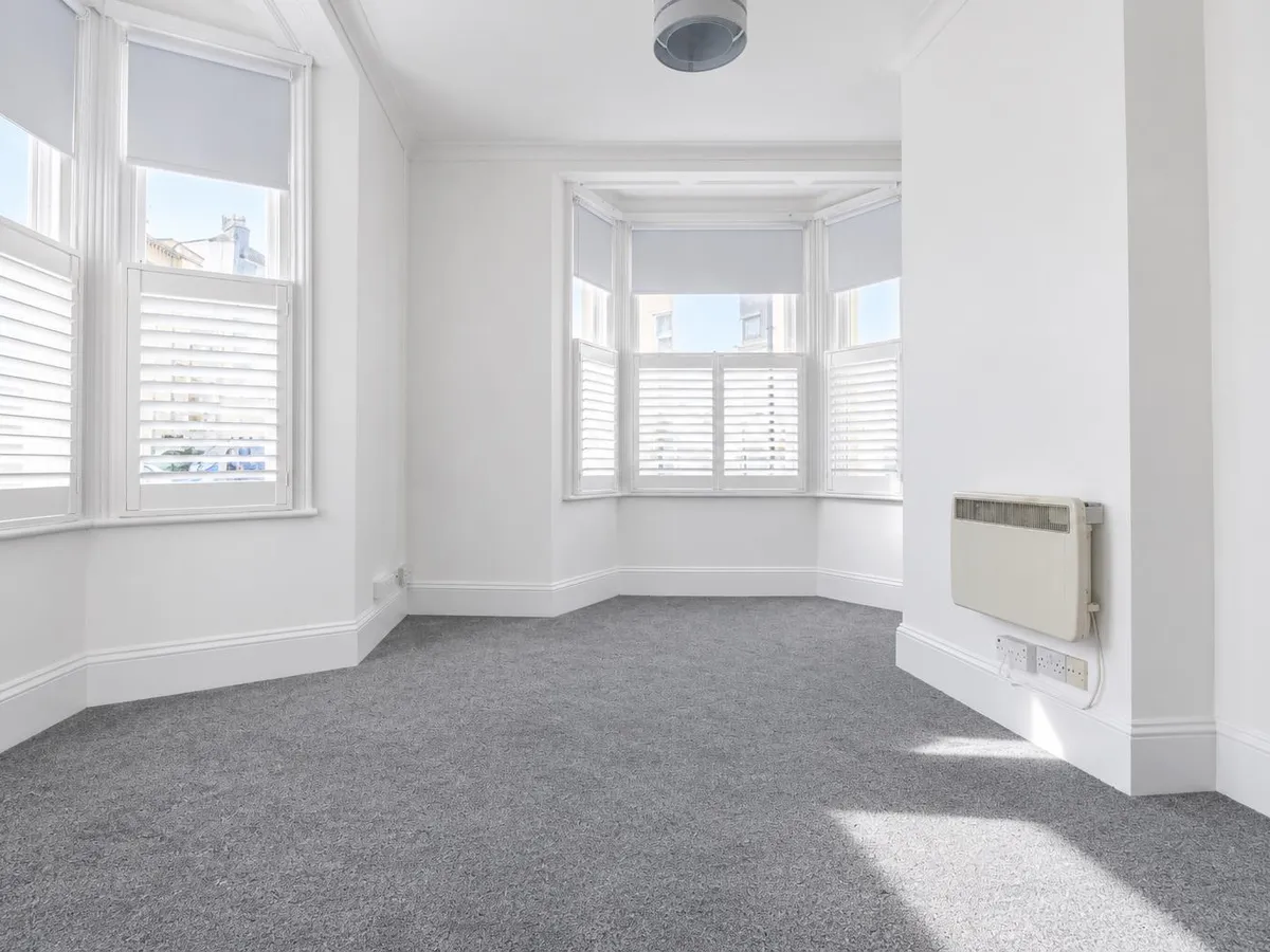 West park avenue st helier 35007870 bright empty room with bay windows