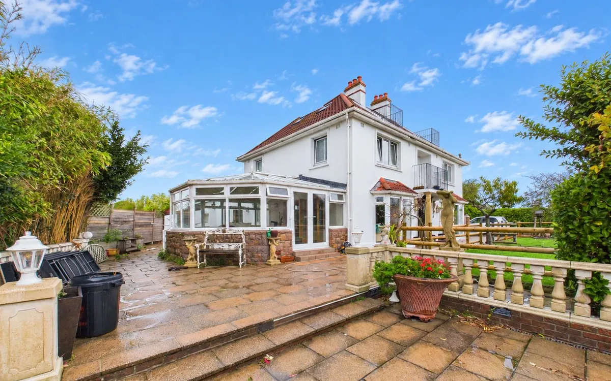 Le vieux beaumont st peter 35021781 sunny blue sky house and garden patio